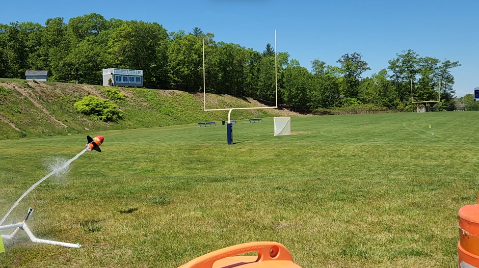 Orange rocket blasts off